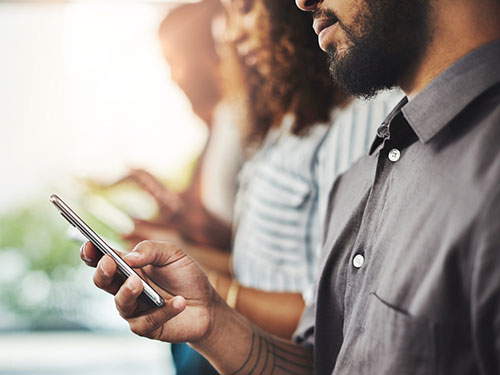 People looking at their phones